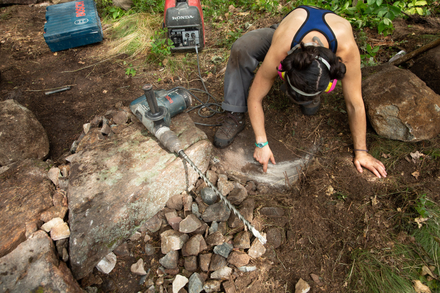 Crandy calculates her next attack with the hammer drill.