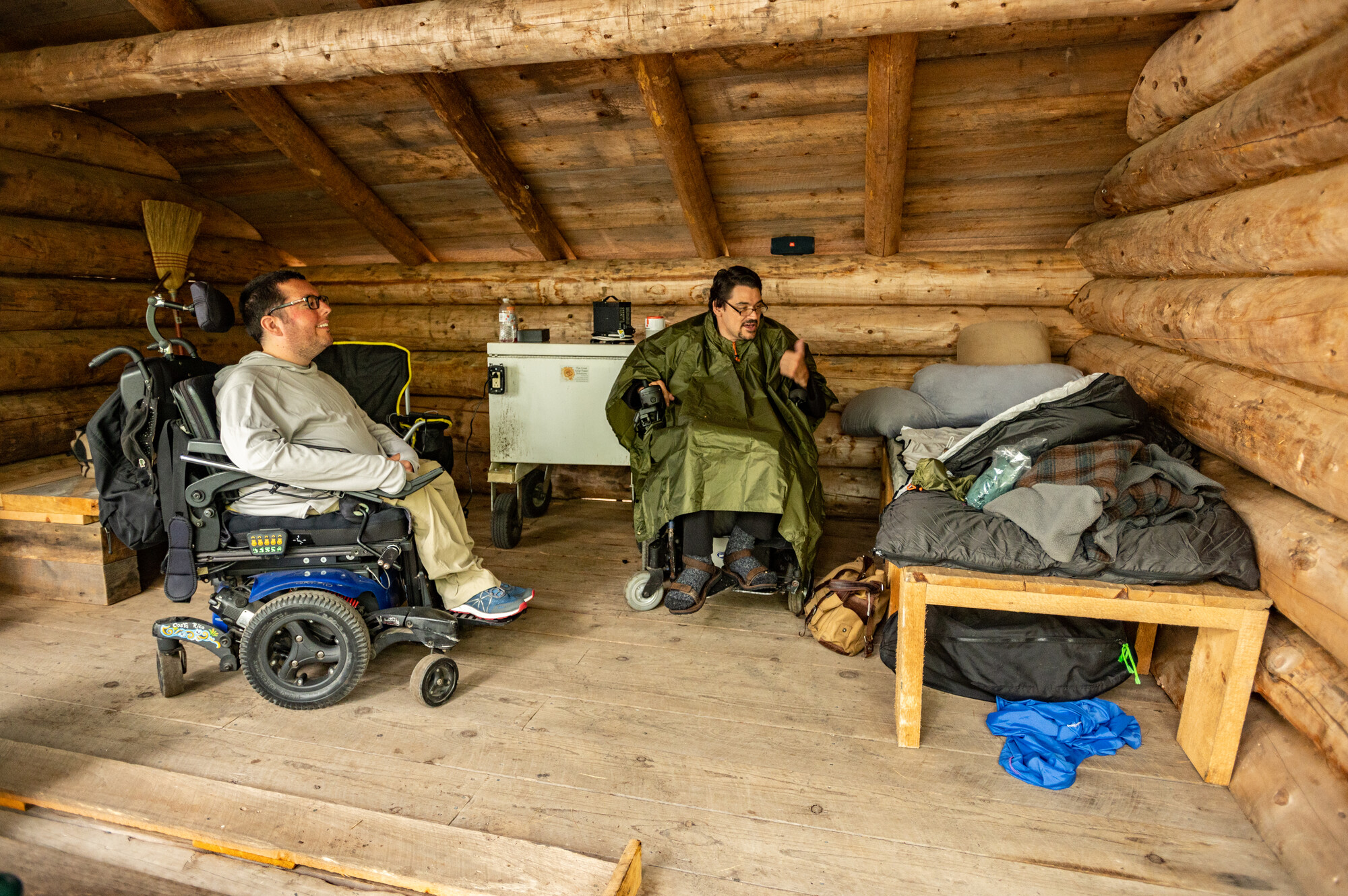 Wheelchair users in a lean to