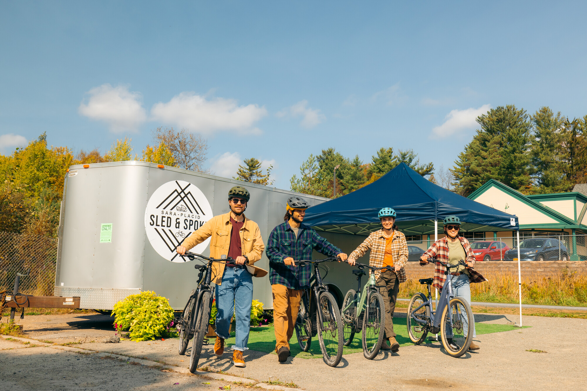 A group of couples in Saranac Lake on their bikes
