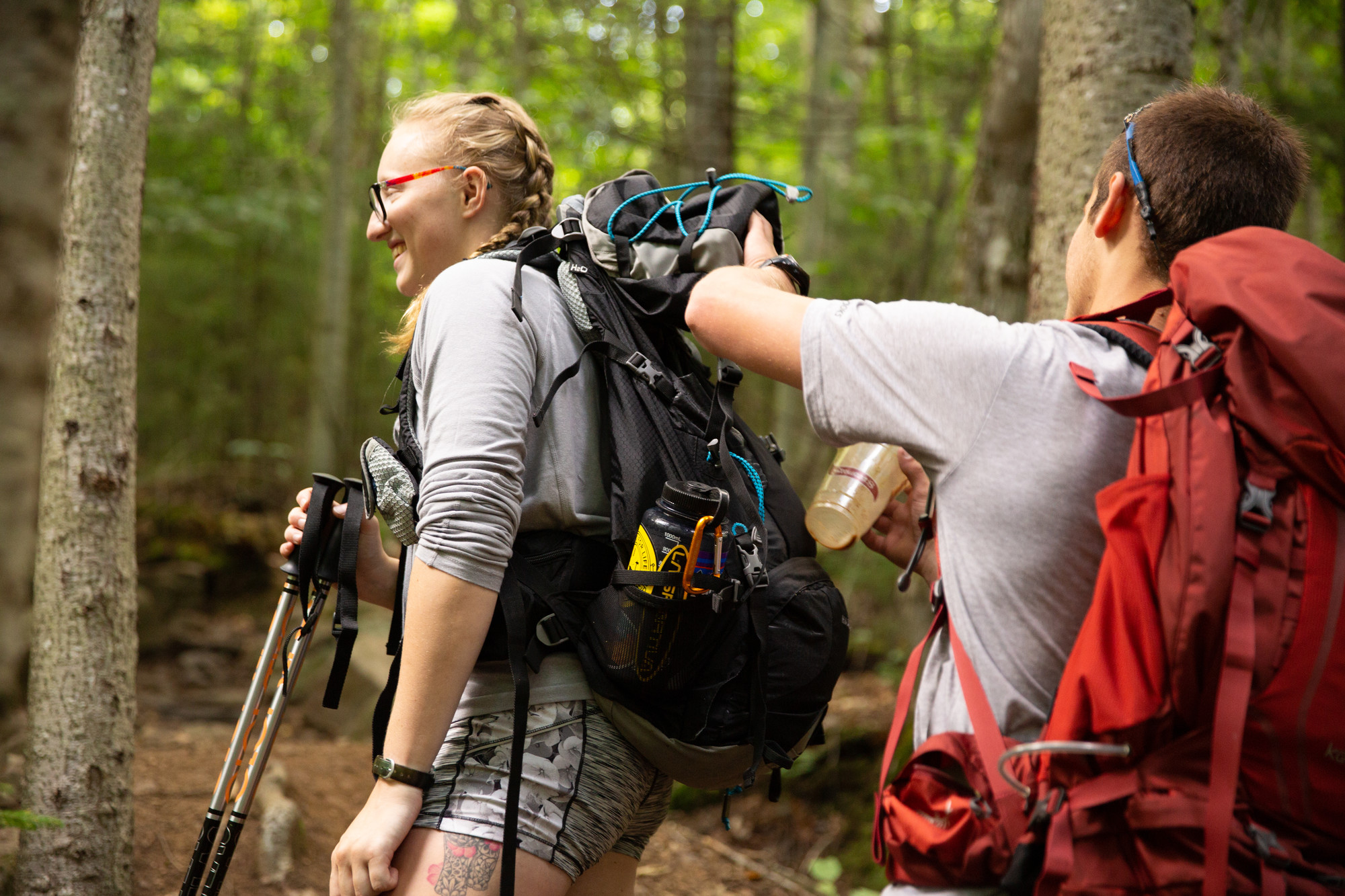 Hikers picking up trash