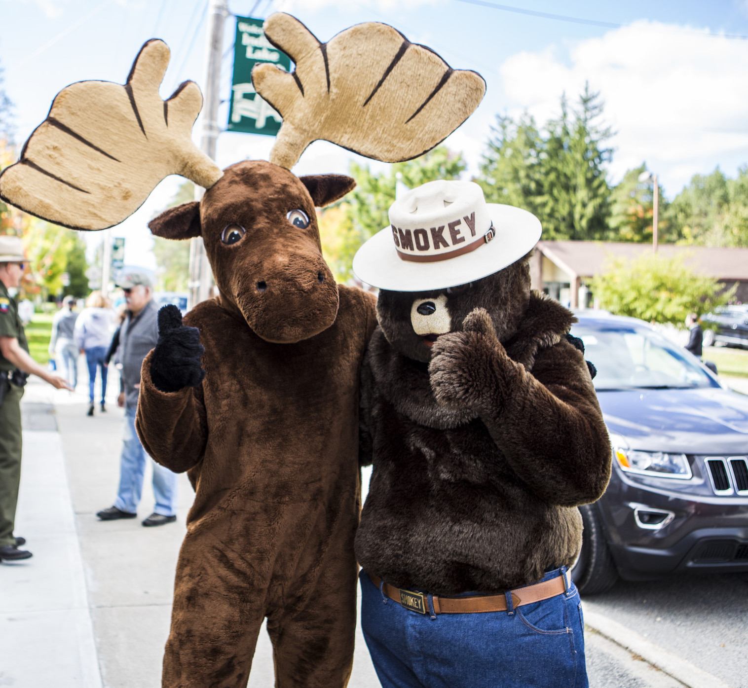 Smokey the Bear with a moose