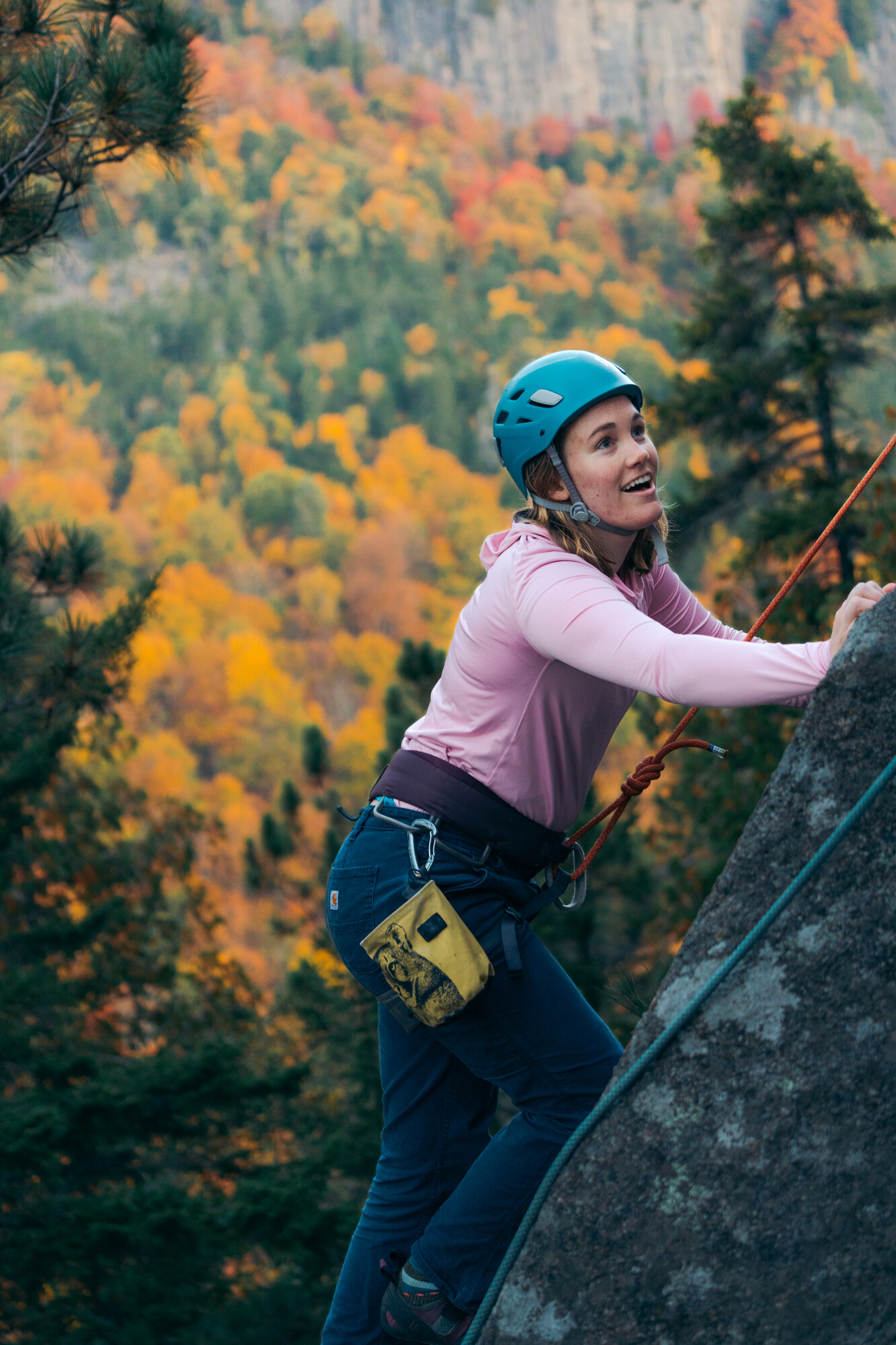 A women climbing in the fall