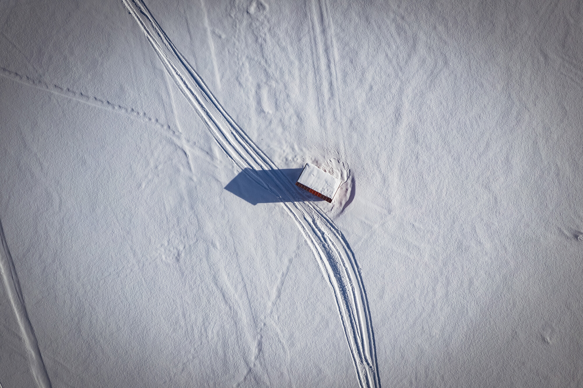 An ice fishing shanty on the ice
