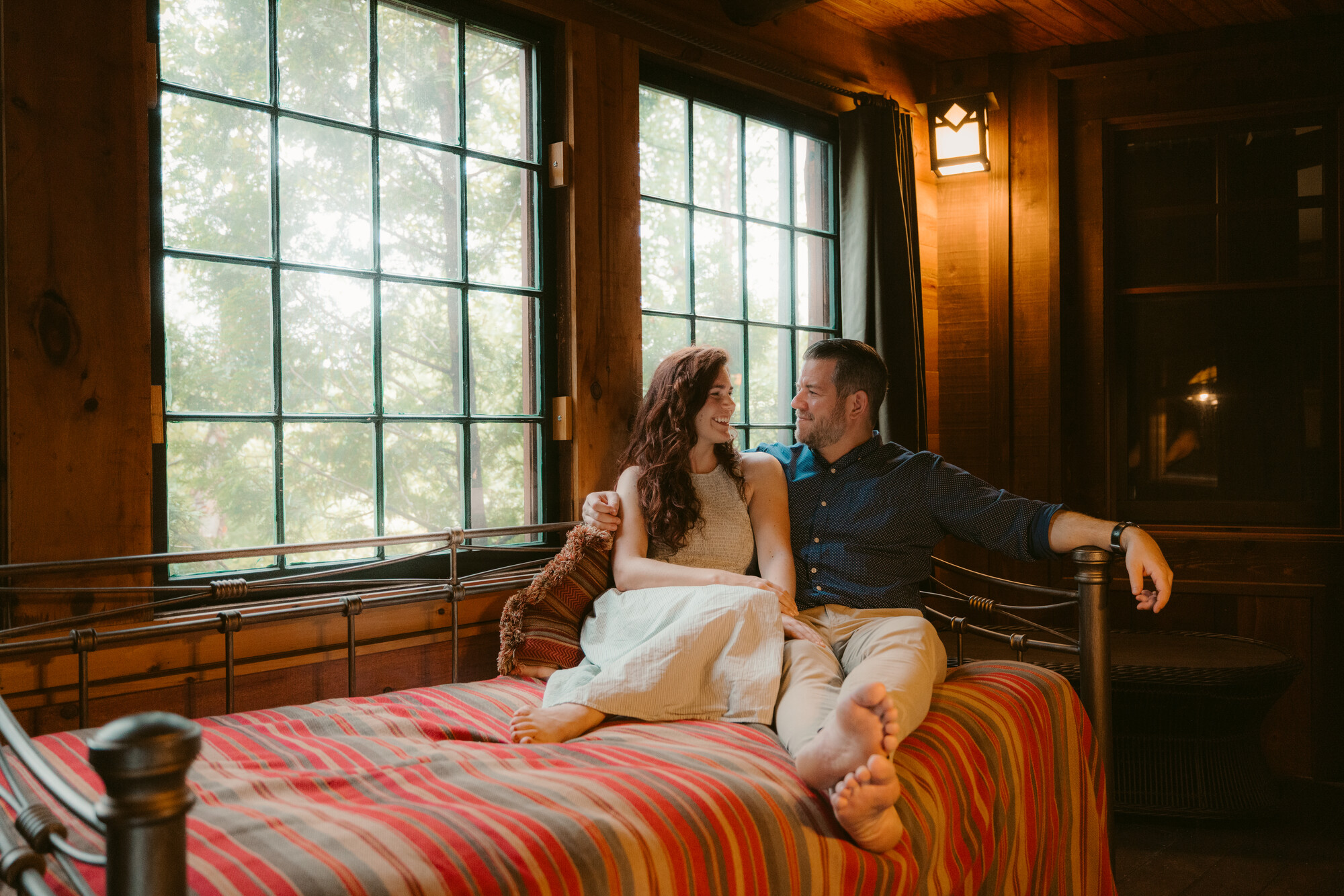 A couple on a cozy bed