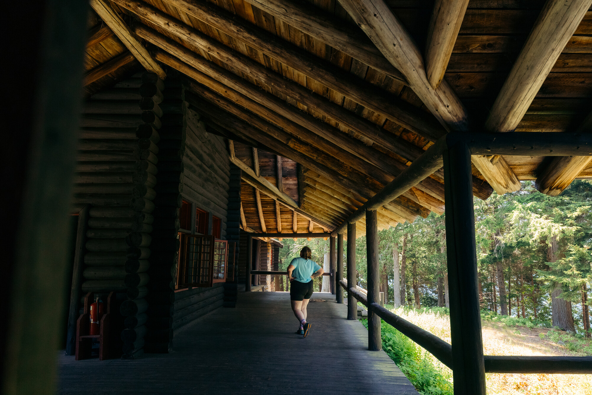 A woman checking out an Adirondack Great Camp