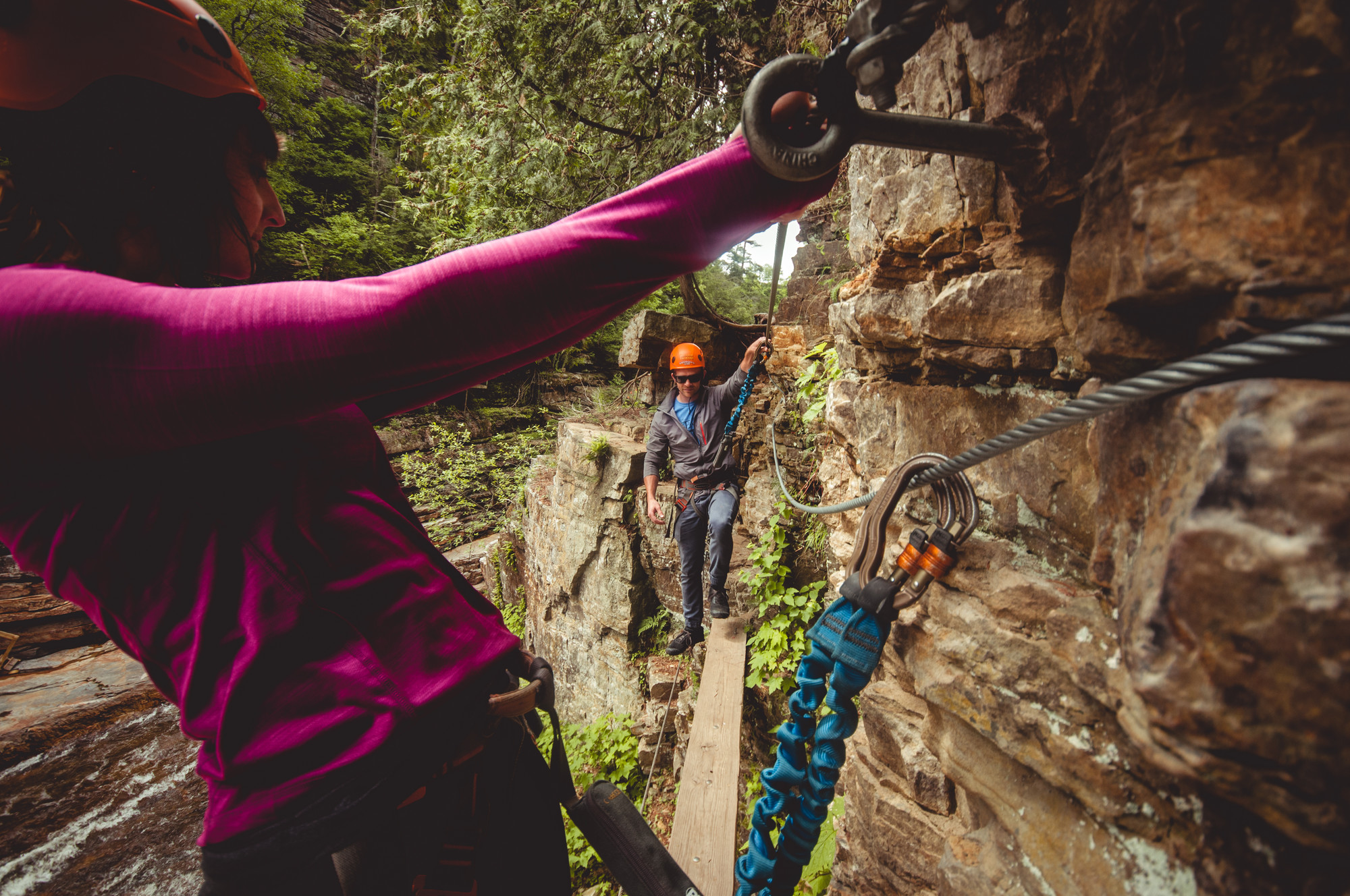 Two people on a via ferrata