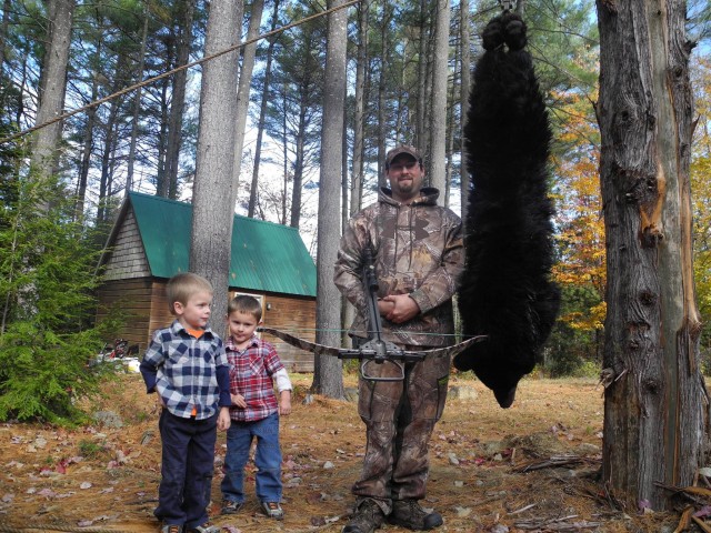 A family with their bear harvest
