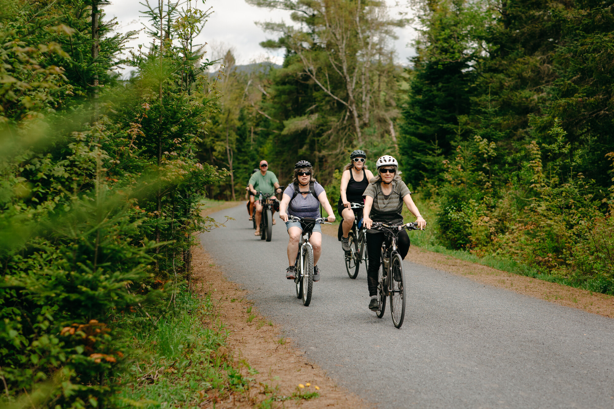 An older group cycling on the Adirondack Rail Trail