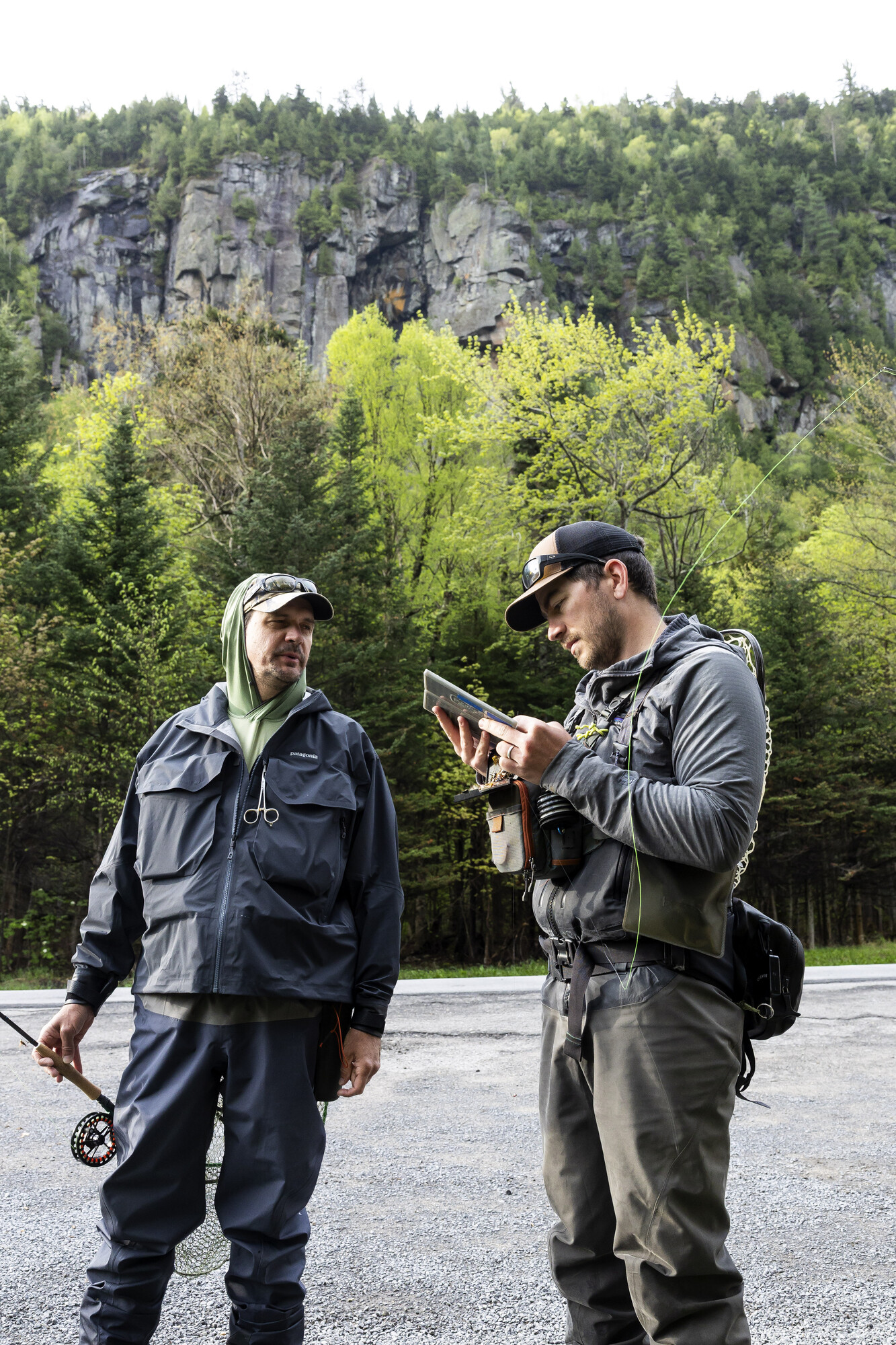 Two fly fishers getting ready