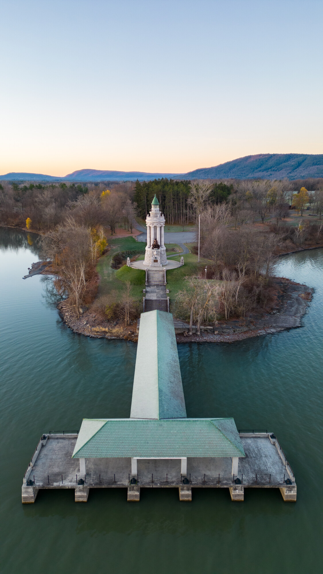 Aerial view of a lighthouse and pier