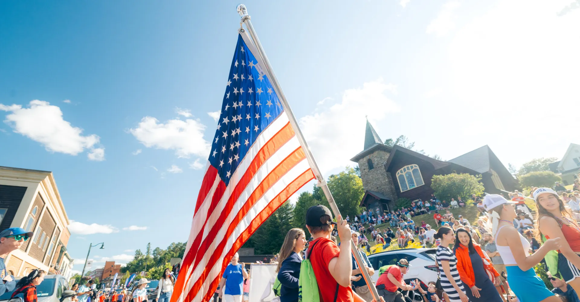 A flag at a 4th of July parade