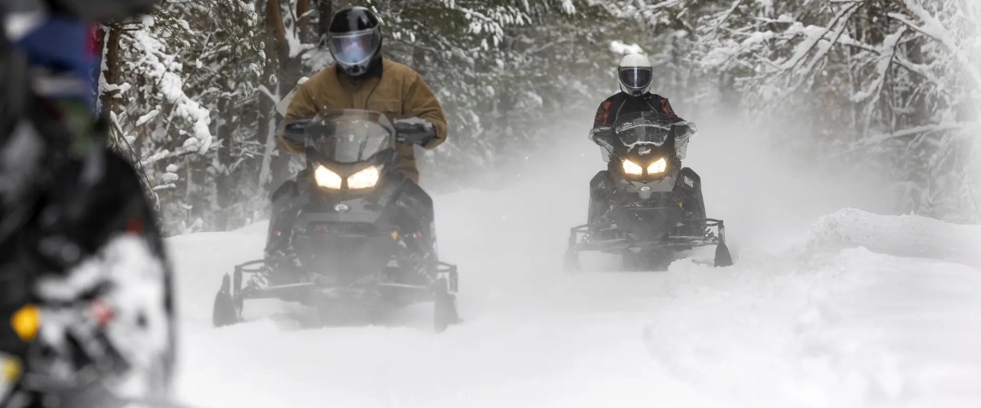 A group of snowmobilers