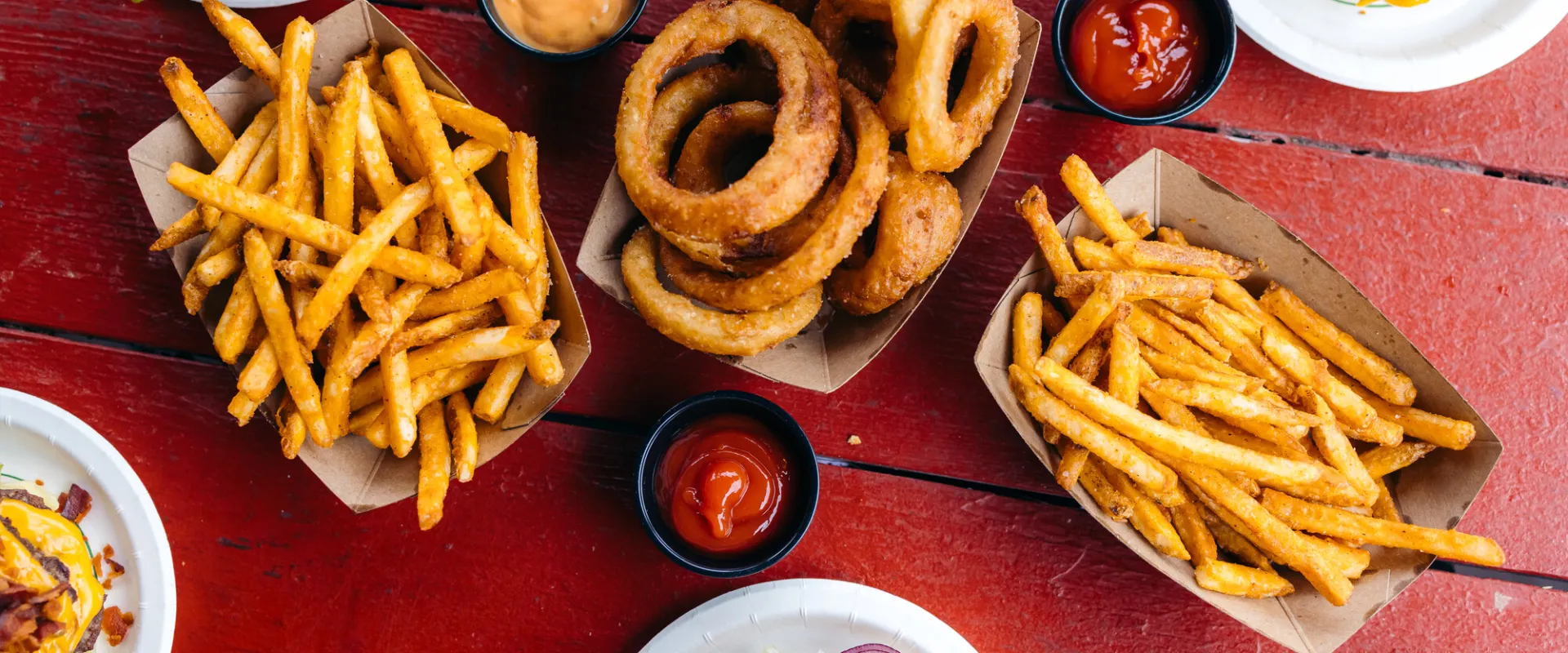 Overhead photo of fries and onion rings