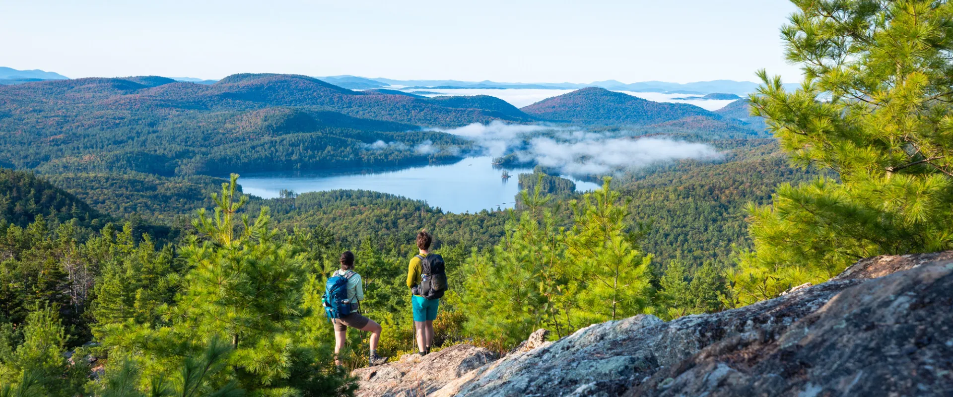 Two hikers near the summit of Treadway Mountain.