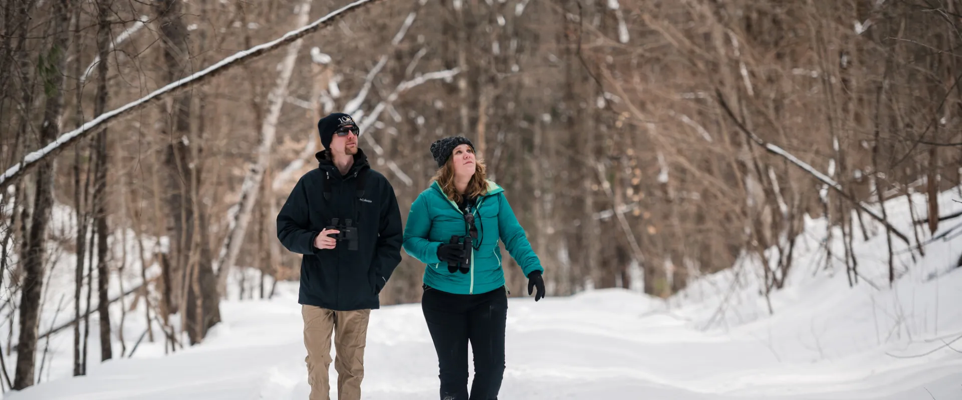 A couple walking through Lewis in winter.