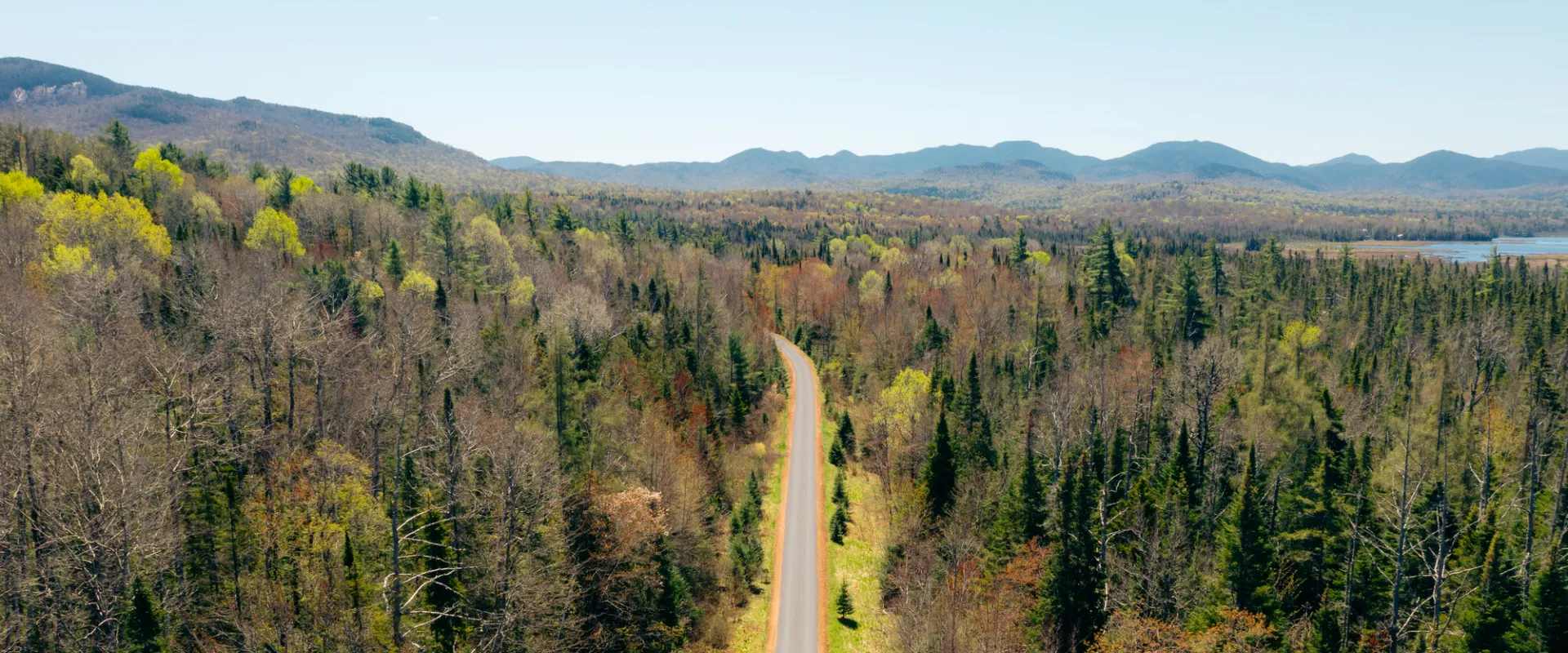The Adirondack Rail Trail seen from the sky in spring