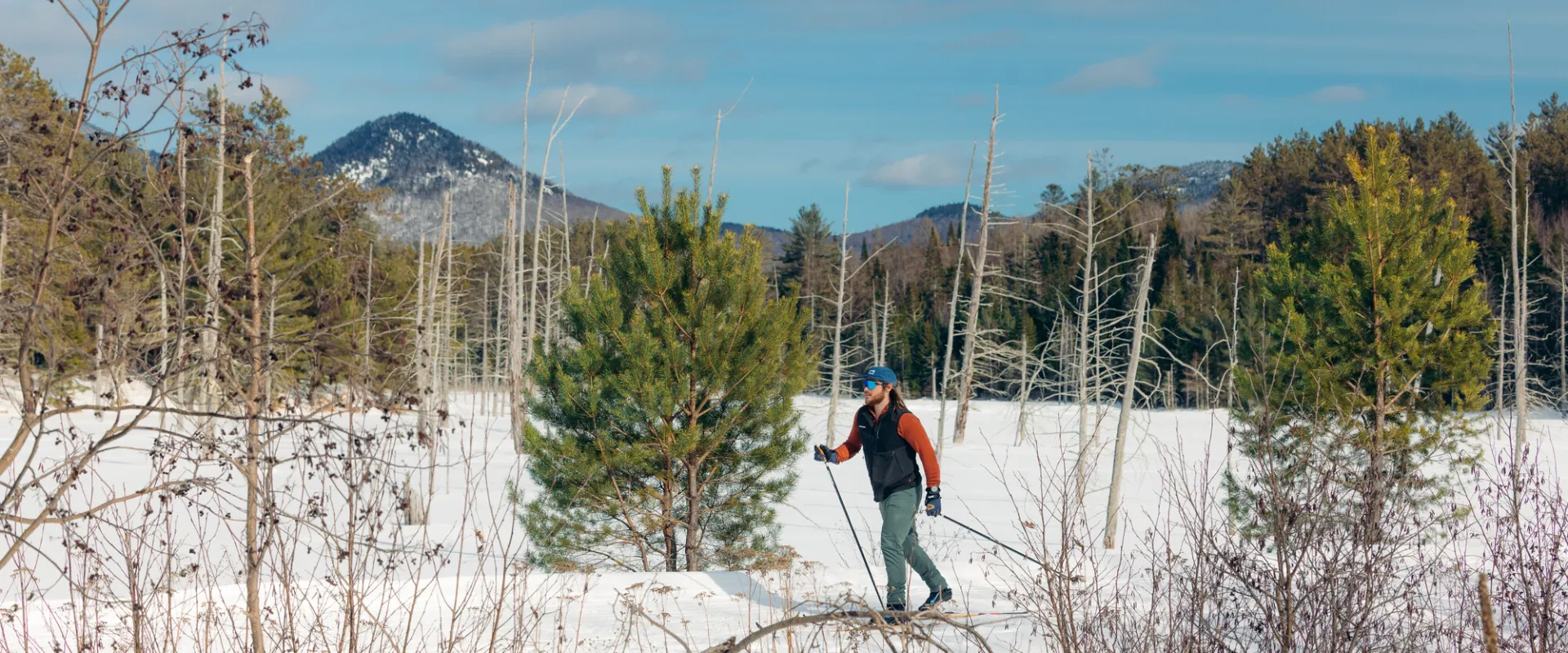 A man xc skiing on the Rail Trail