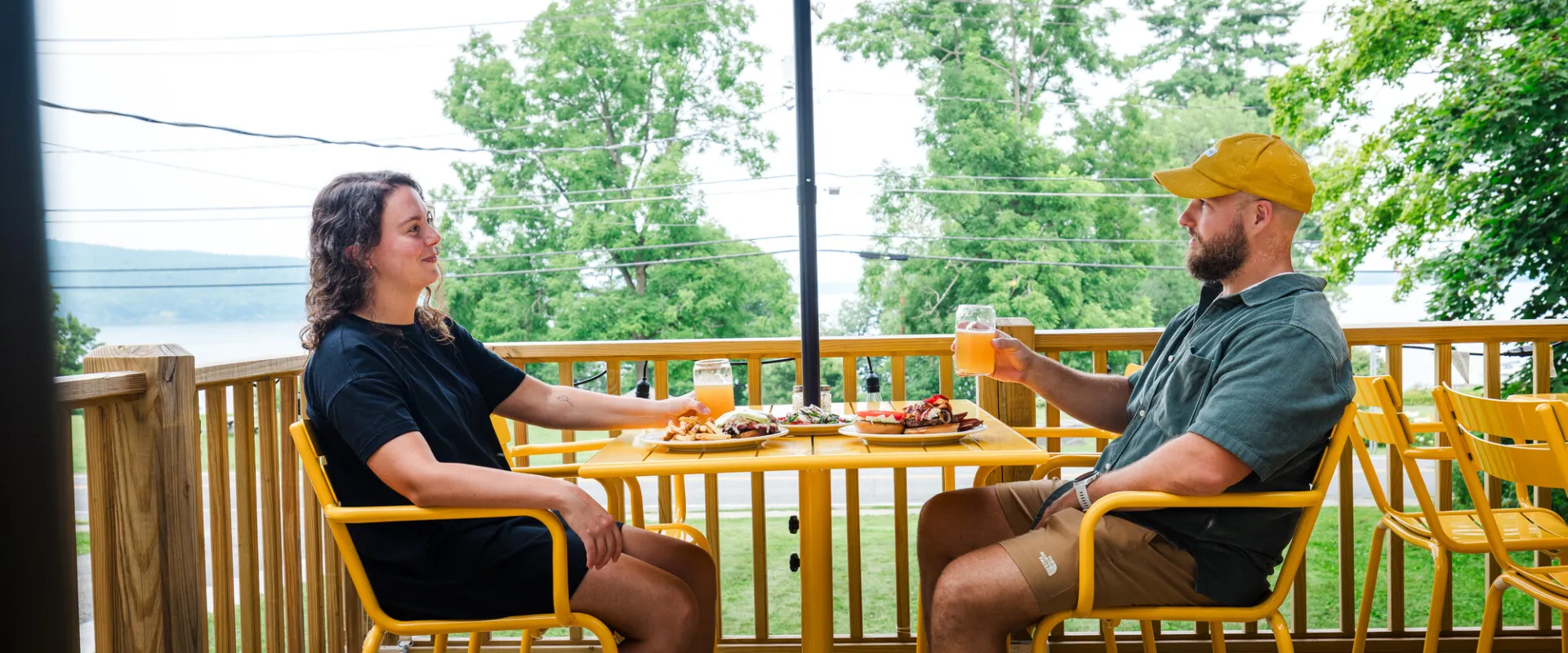 A couple dining on a deck