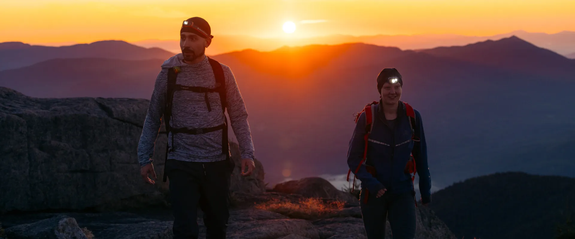 Two hikers in the morning light