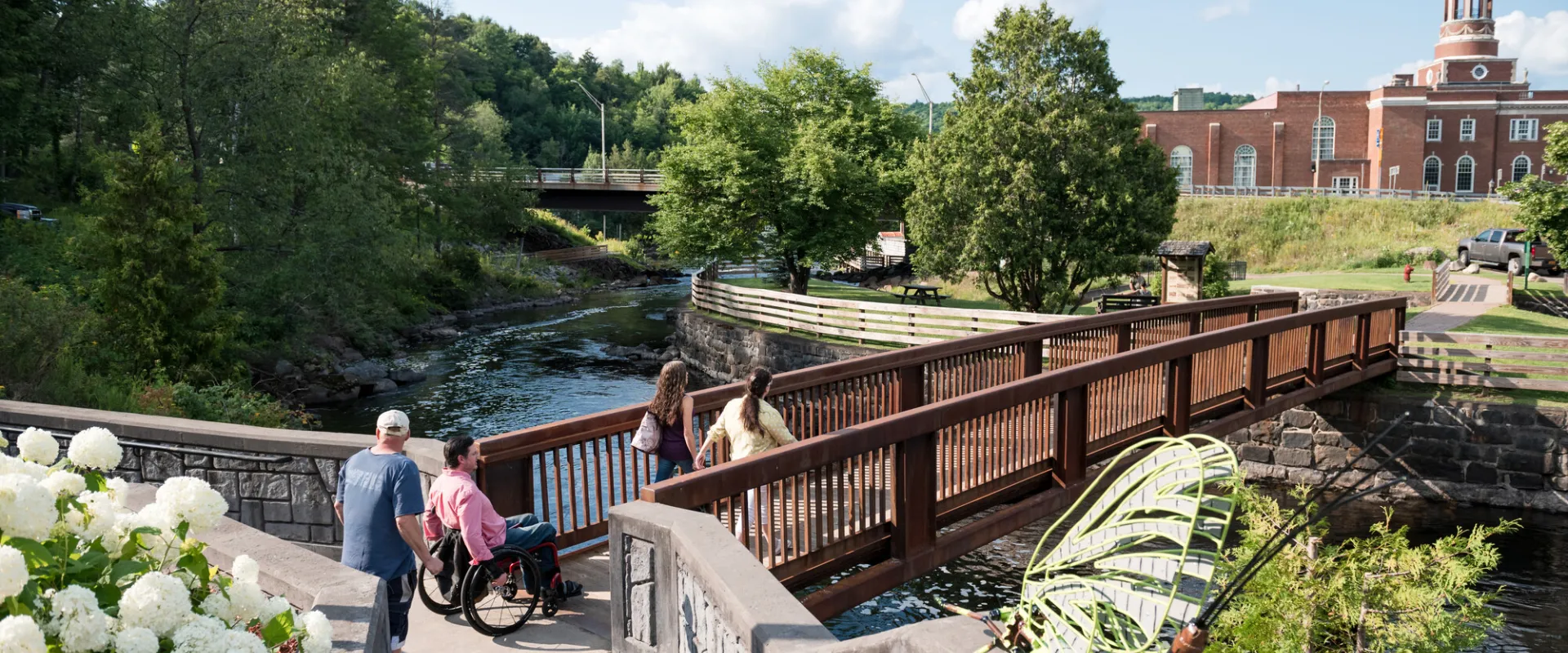 People walking on the Saranac Lake River Trail