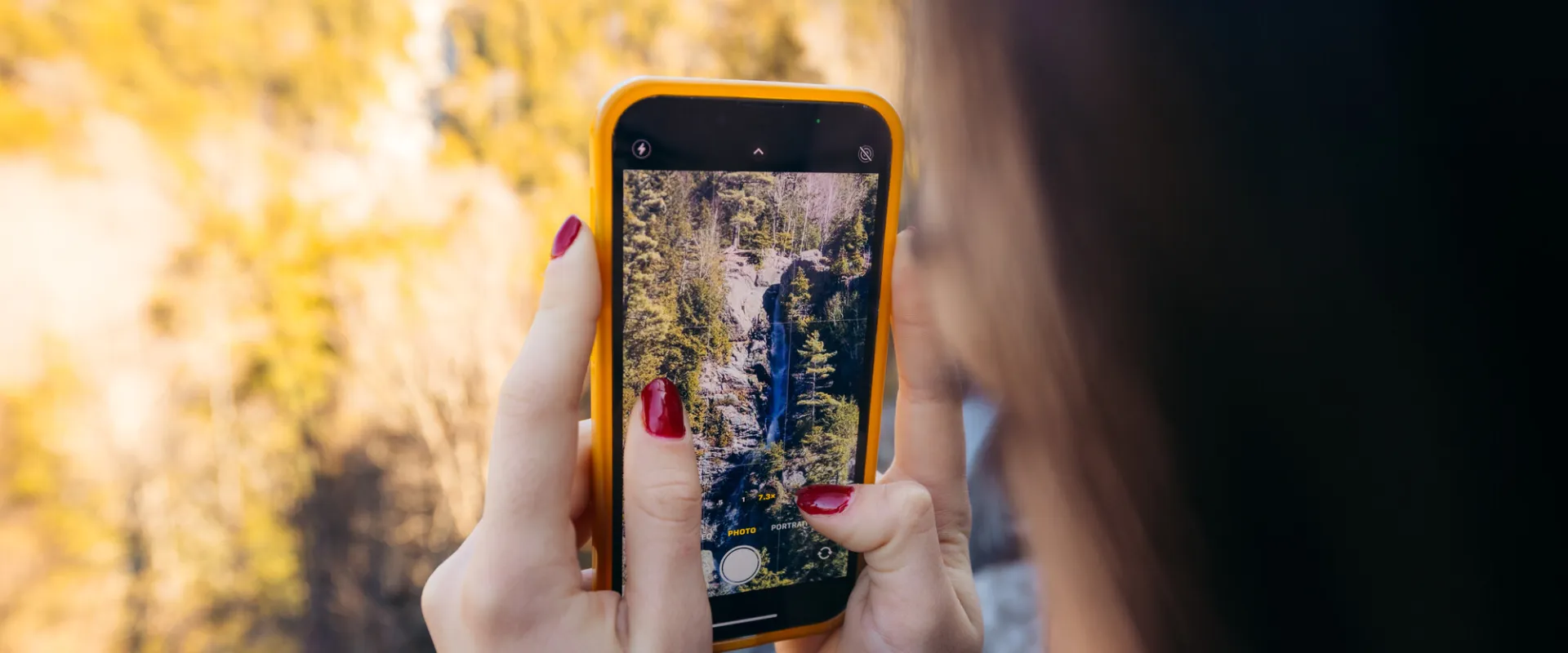 Taking a photo of a waterfall in the Adirondacks.