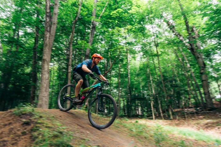 Mountain biker on trail in Saranac Lake