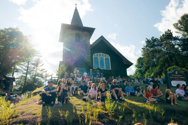 A crowd watching a parade