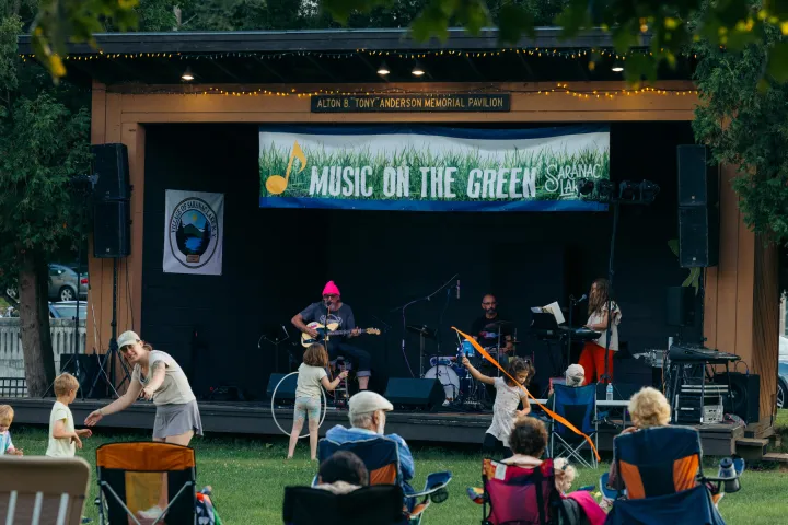 A music event at a wooden bandshell