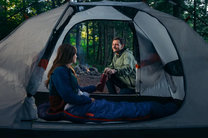 A couple camping in Saranac Lake