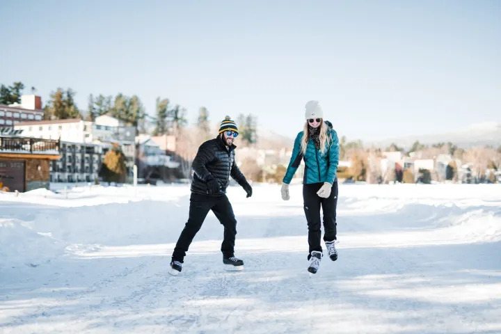 Two ice skaters on Mirror Lake