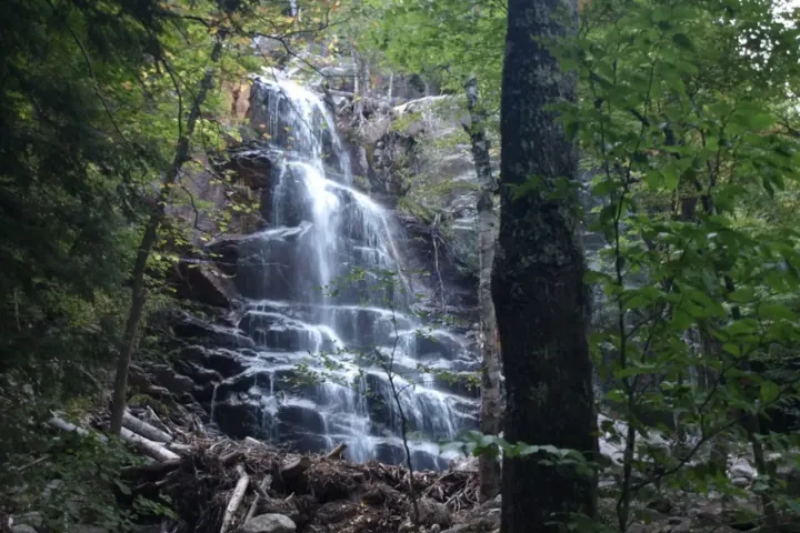 A tall, fanning waterfall