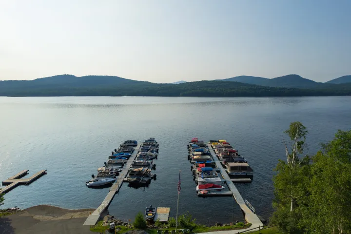 Two docks with boats on Indian Lake