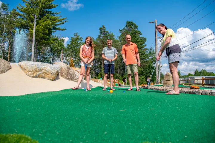 A family mini golfing