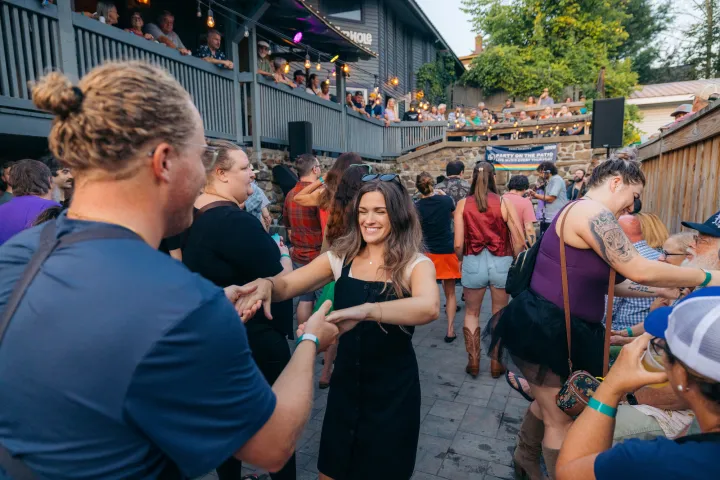 A woman dancing at a live music event