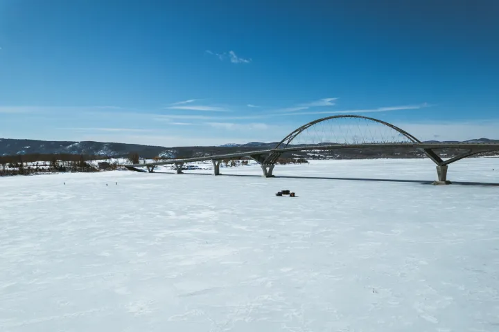 Aerial view of frozen Lake Champlain and the Crown Point Bridge