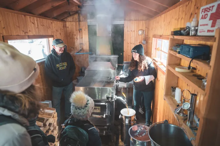 Sugaring in a shack with lots of people