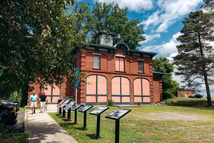 An older couple outside the Iron Center Museum