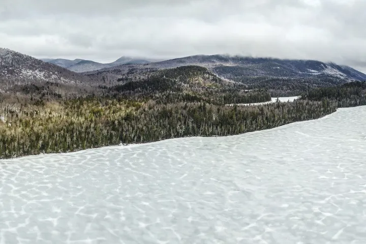 A frozen lake in the mountains