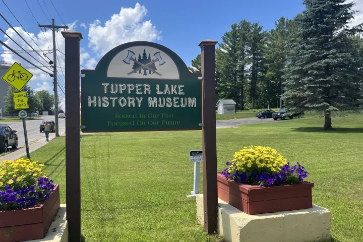 A sign for Tupper Lake History Museum