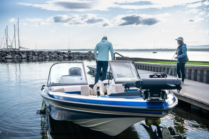 A couple docking their boat