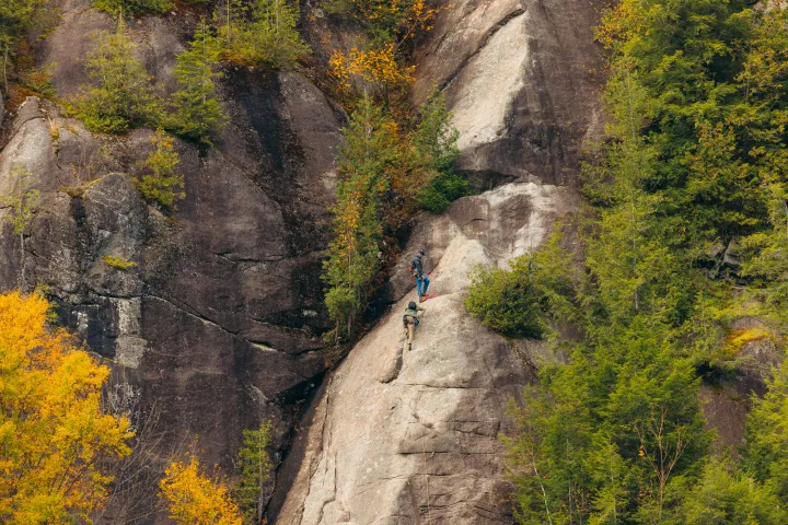 Two climbers on an autumn multipitch