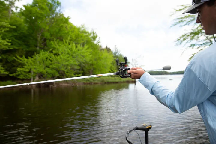 A man casting a fishing rod
