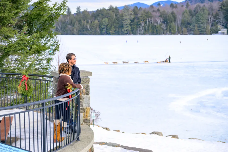 Two people at Mid's Park in Lake Placid during the winter