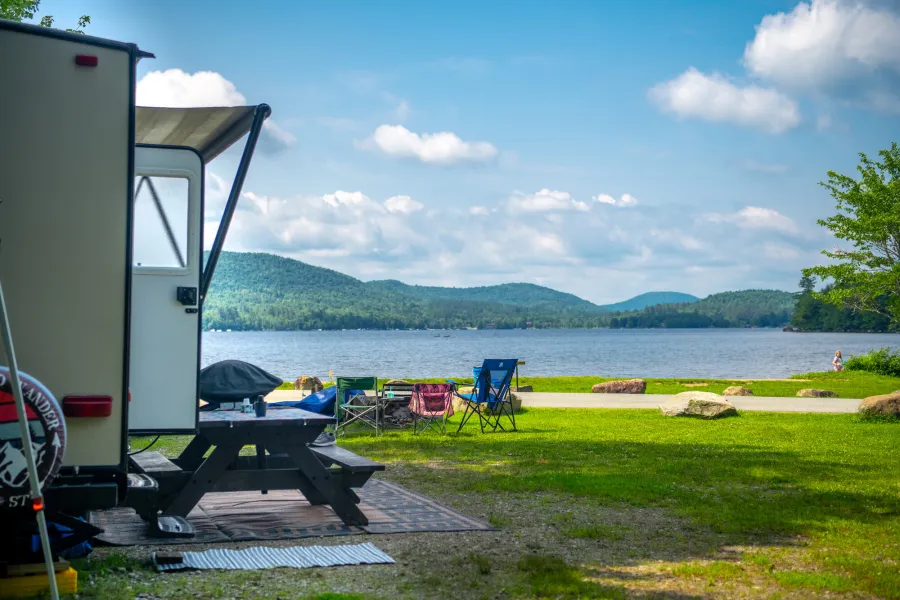 An RV at a campground near a beach