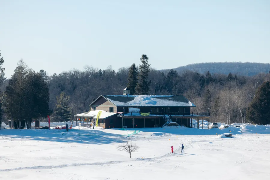 A xc ski lodge seen from far away