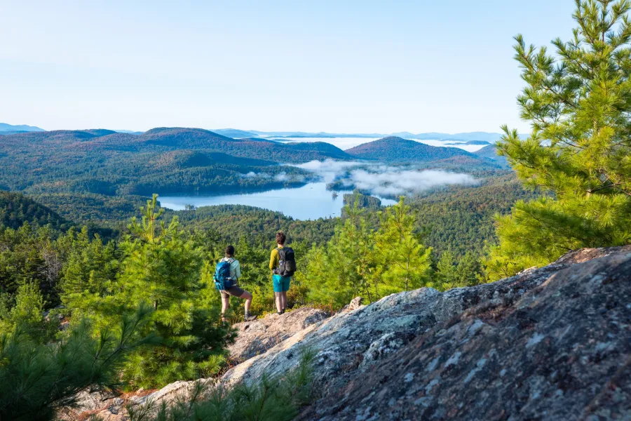Two hikers near the summit of Treadway Mountain.