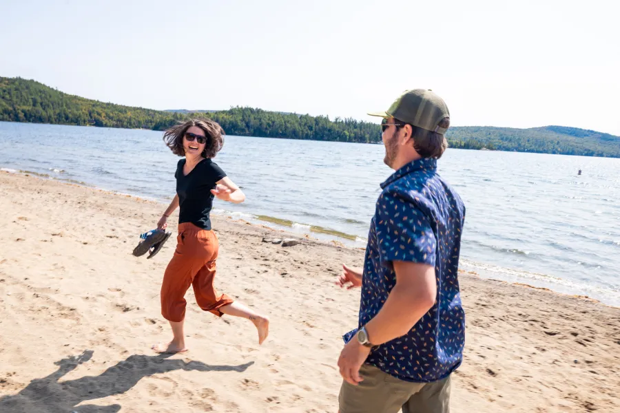 A couple running on the beach