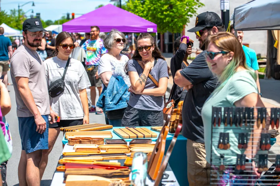People at an art booth