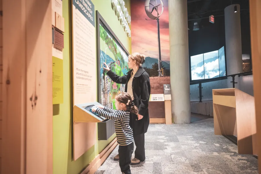 A family looking at a museum exhibit