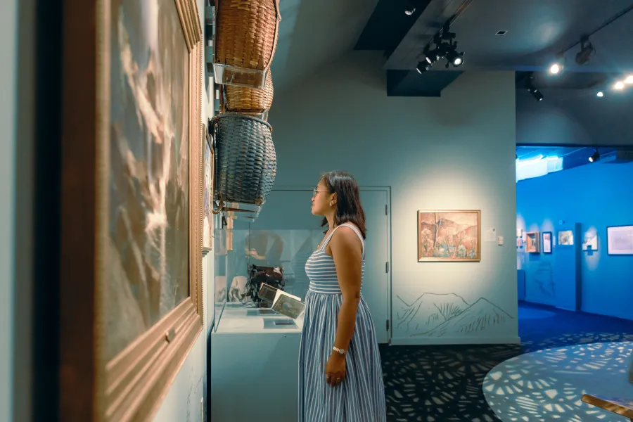 A woman in a museum exhibit